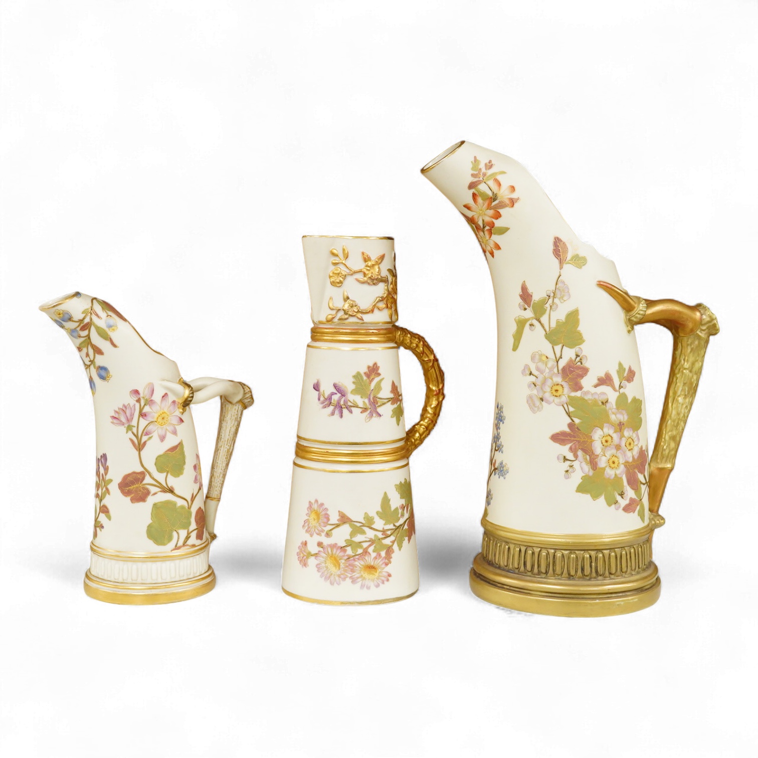 Two graduated Royal Worcester jugs, shape 1116, and another, shape 1047